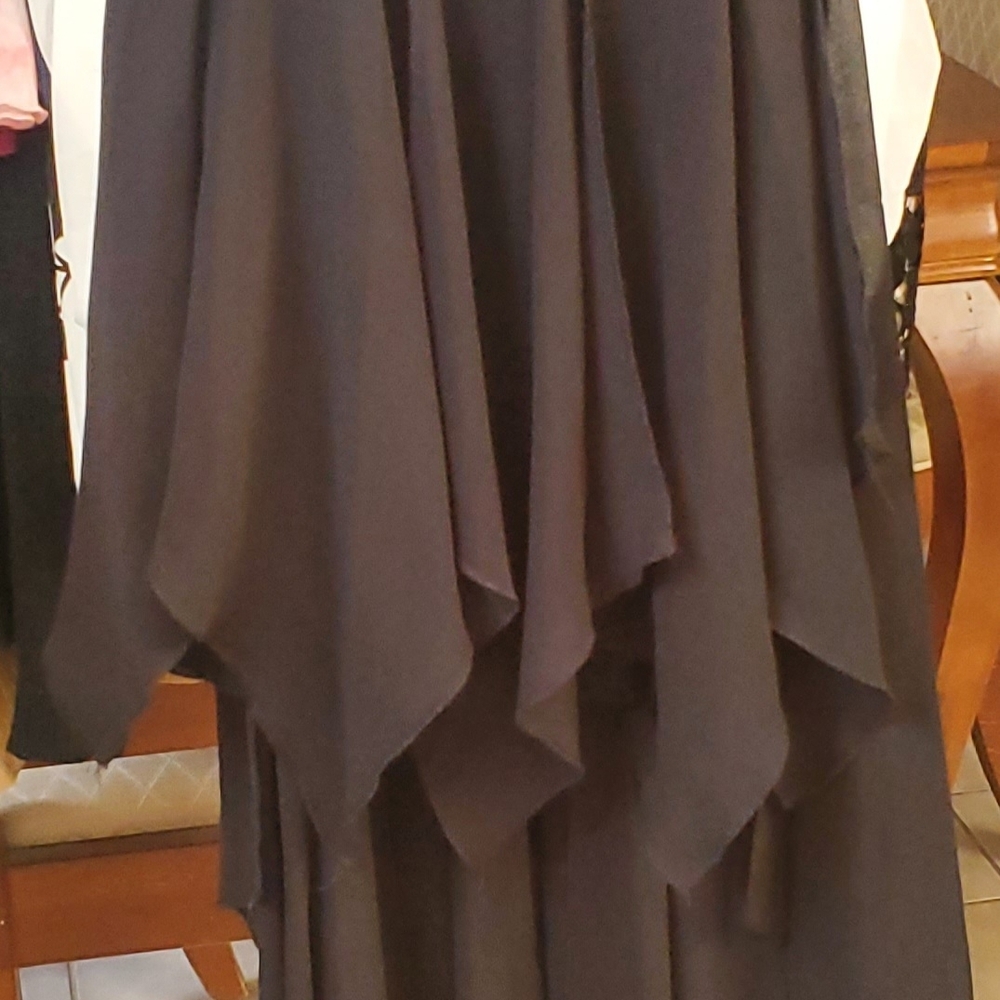 Elegant Women's Strapless Black Mini Dress With Draping Material.  Sweetheart